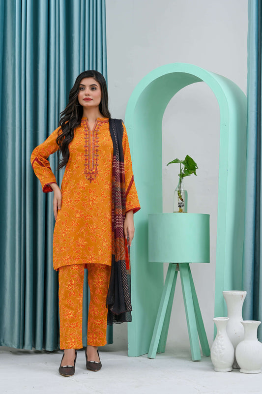 Model wearing a vibrant orange embroidered and printed lawn suit, complemented by a stylish black dupatta.