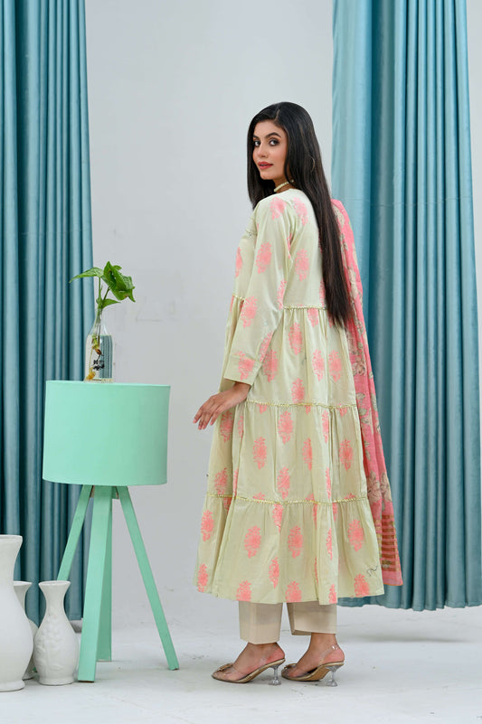 Back view of a woman in a light green frock with dupatta, displaying its flared design and elegance.