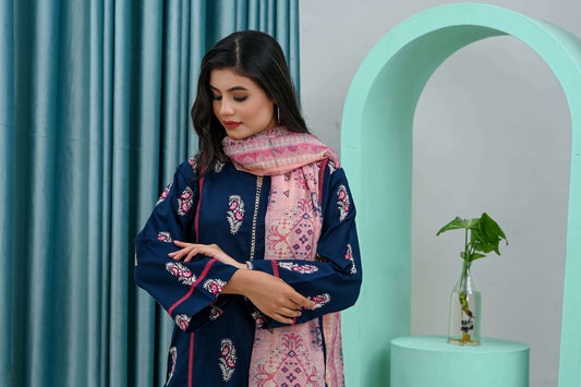 Elegant model in a navy blue shirt with a pink dupatta, showcasing refined style and versatility for semi-formal wear.